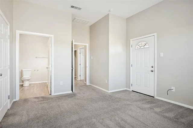 a bathroom with a sink vanity and a mirror