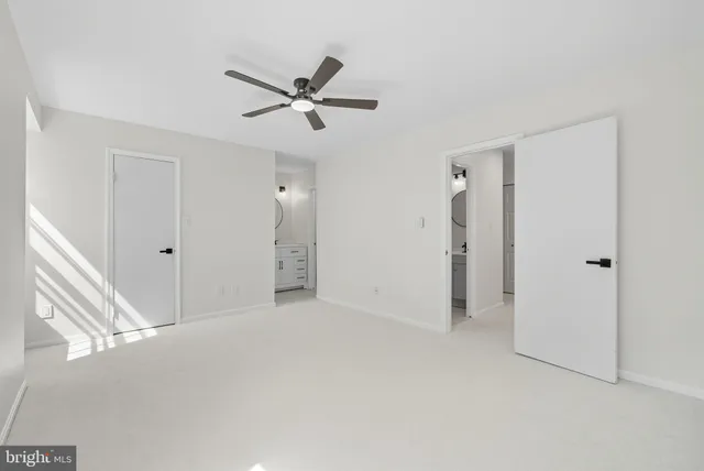 a view of a livingroom with a ceiling fan