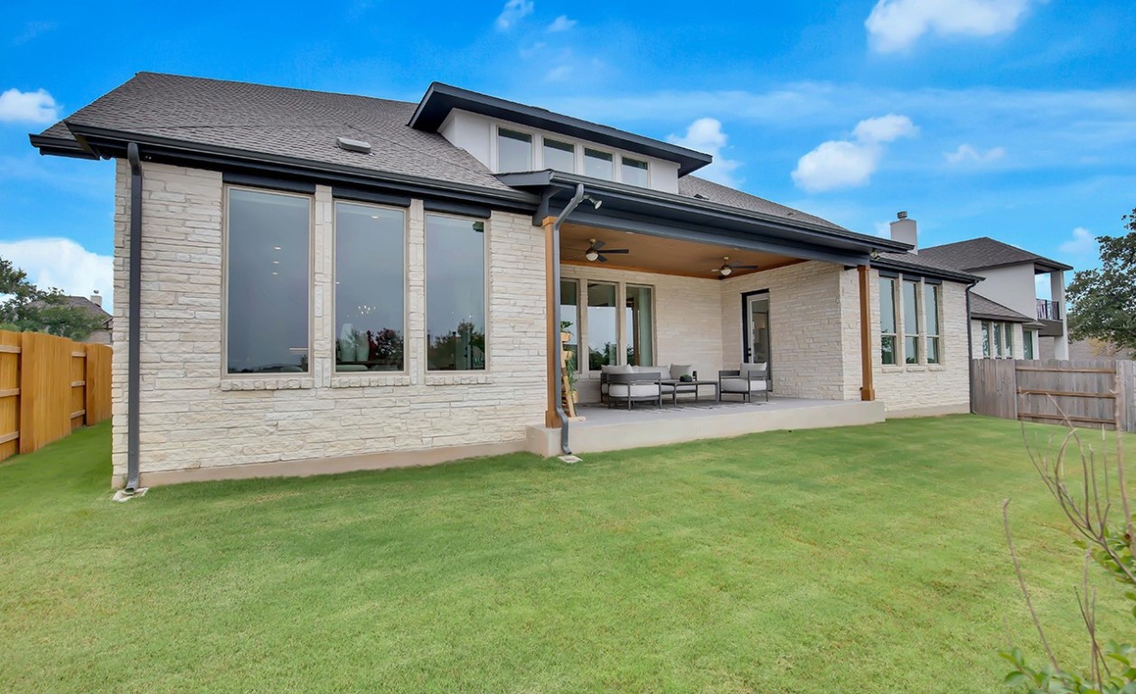 1232 Terrace View Drive Georgetown, TX 78628 - Photo 19 of 22 Rear view of house featuring a fenced backyard, a ceiling fan, an outdoor hangout area, and a patio
