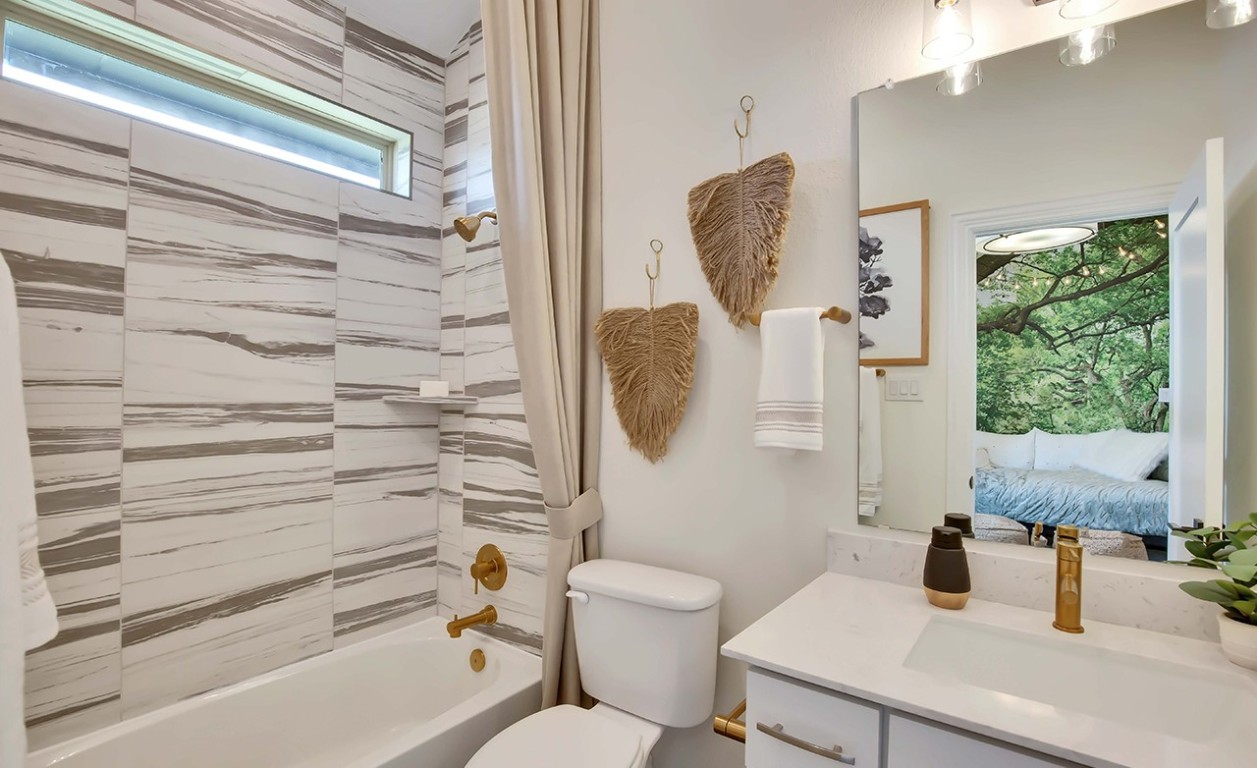 1232 Terrace View Drive Georgetown, TX 78628 - Photo 10 of 22 Ensuite bathroom with shower / bath combo with shower curtain and vanity