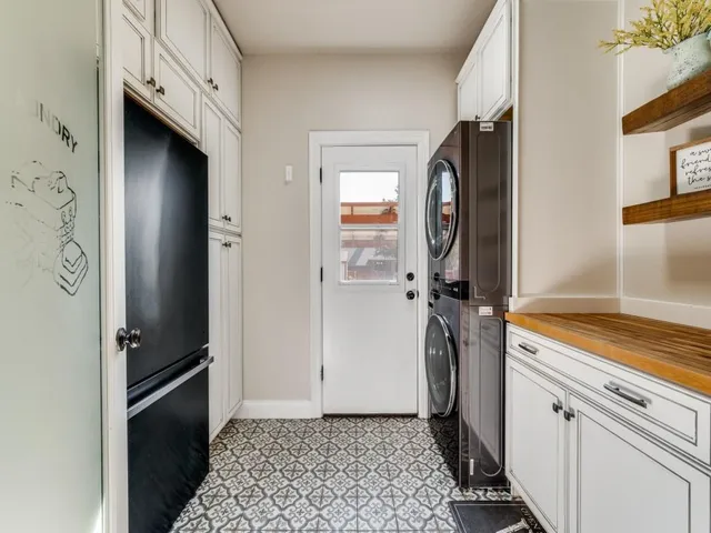 a bathroom with a sink a mirror and a shower