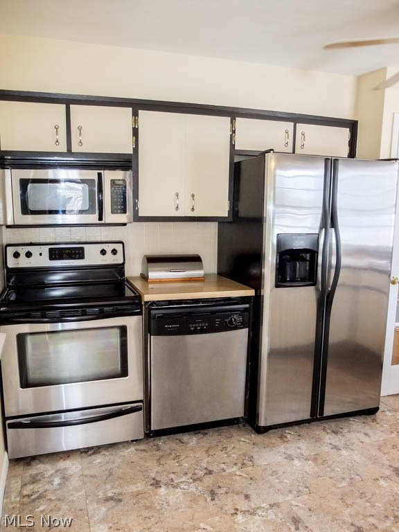 866 Randolph Road Mogadore, OH 44260 - Photo 4 of 19 Kitchen has stainless steel appliances.