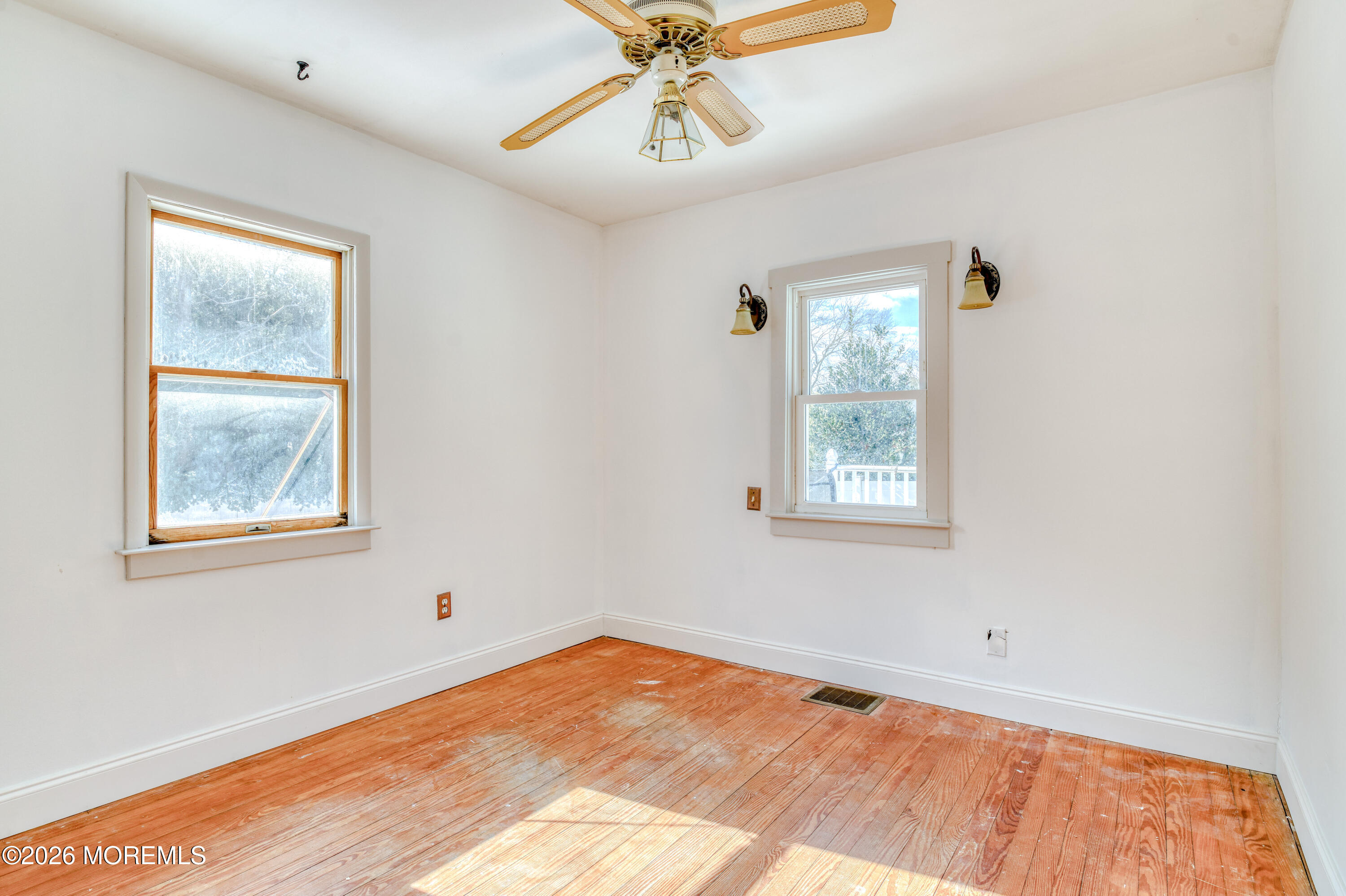 7 Schoolhouse Road Neptune Township, NJ 07753 - Photo 19 of 36 a view of an empty room with a window