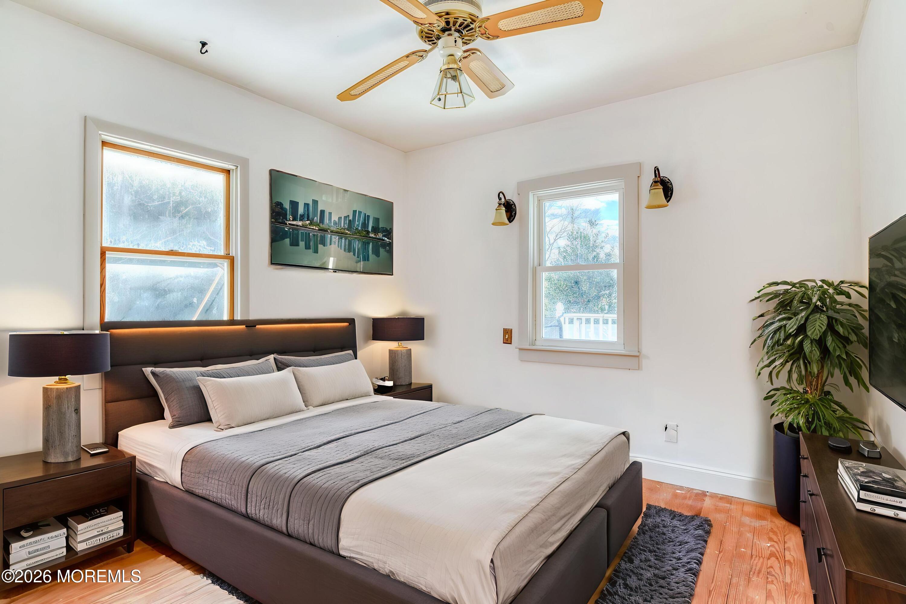 7 Schoolhouse Road Neptune Township, NJ 07753 - Photo 20 of 36 a bedroom with bed and a window