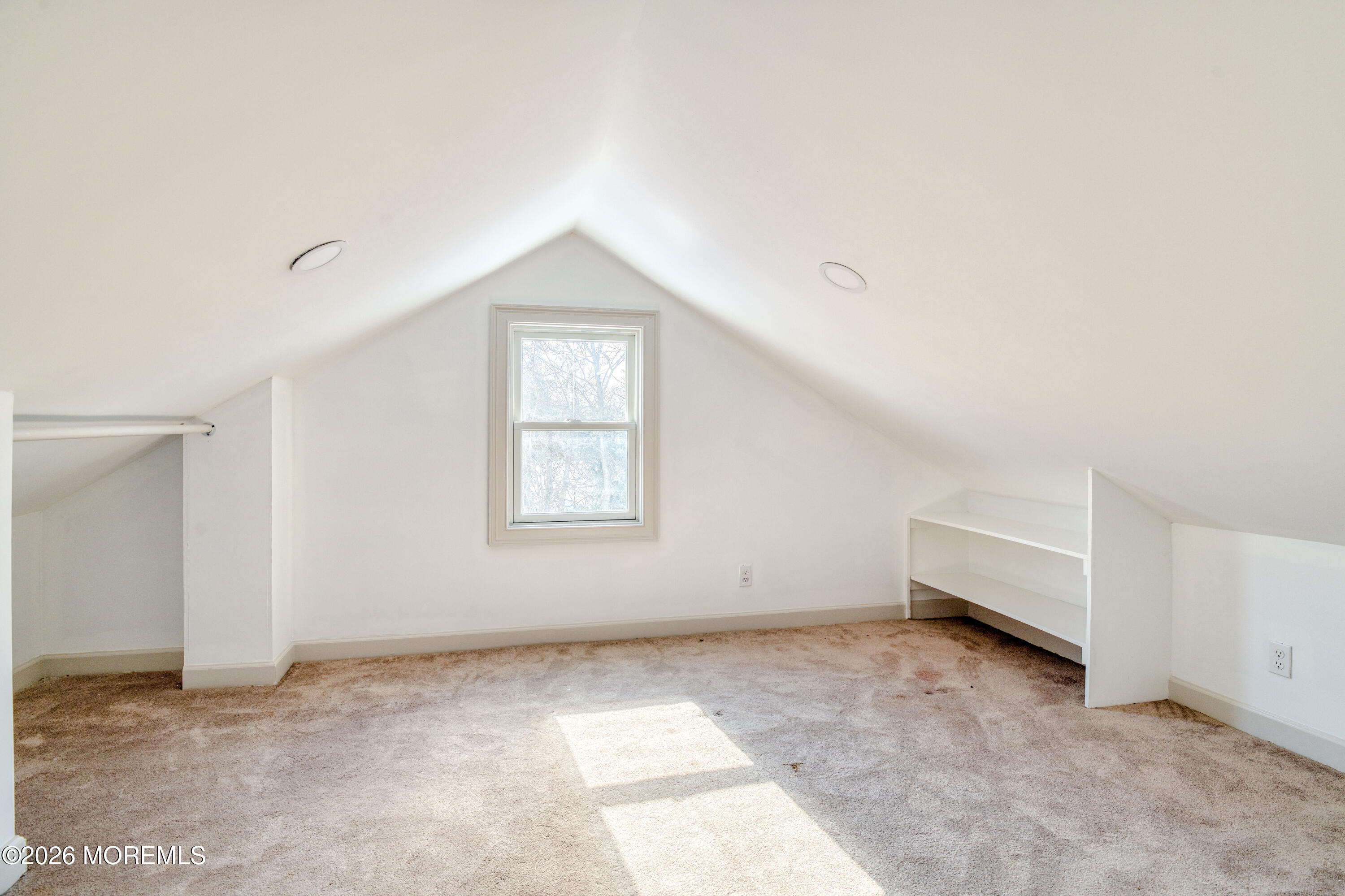 7 Schoolhouse Road Neptune Township, NJ 07753 - Photo 25 of 36 an empty room with a window