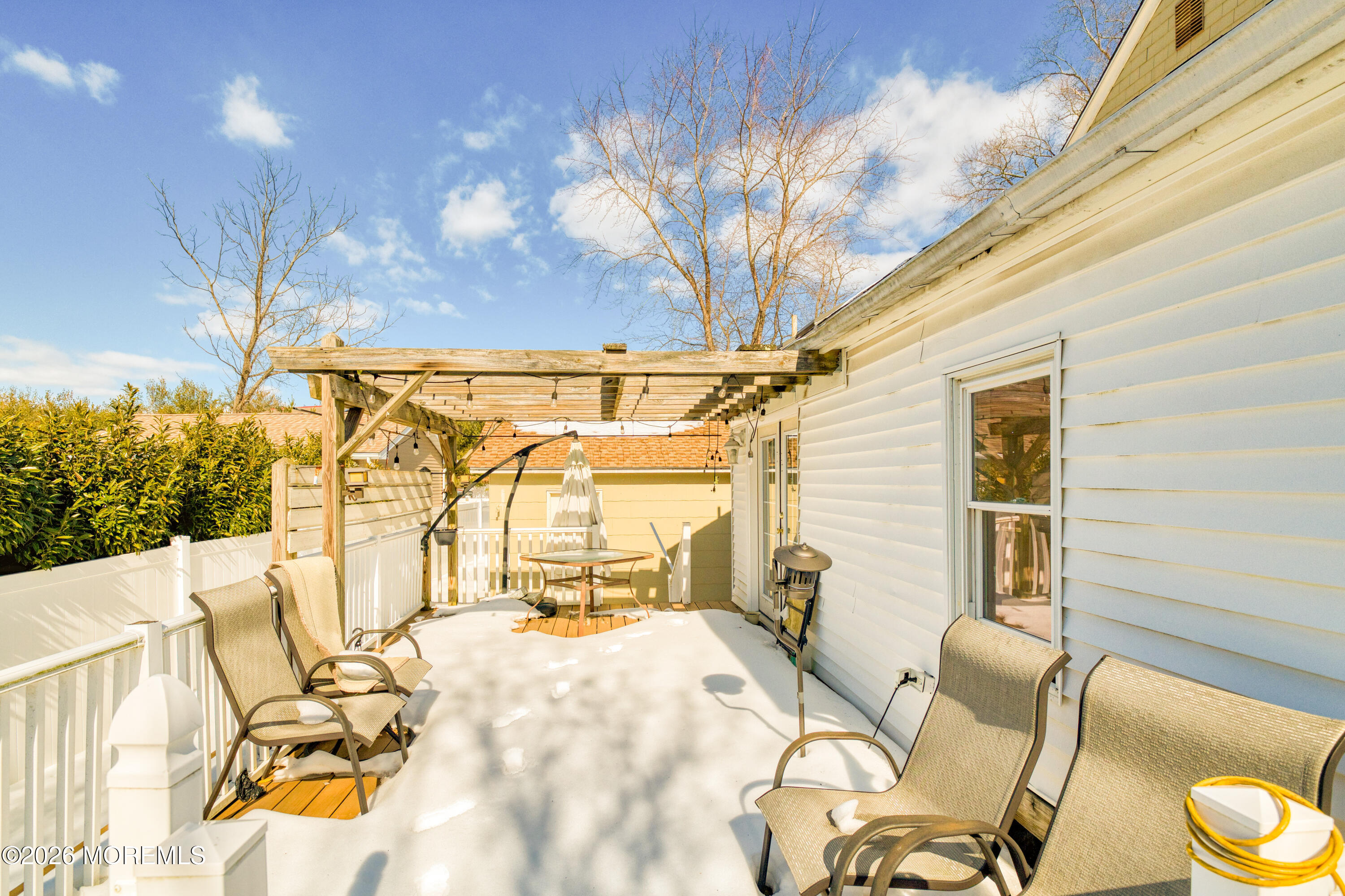7 Schoolhouse Road Neptune Township, NJ 07753 - Photo 31 of 36 a view of balcony with table and chairs