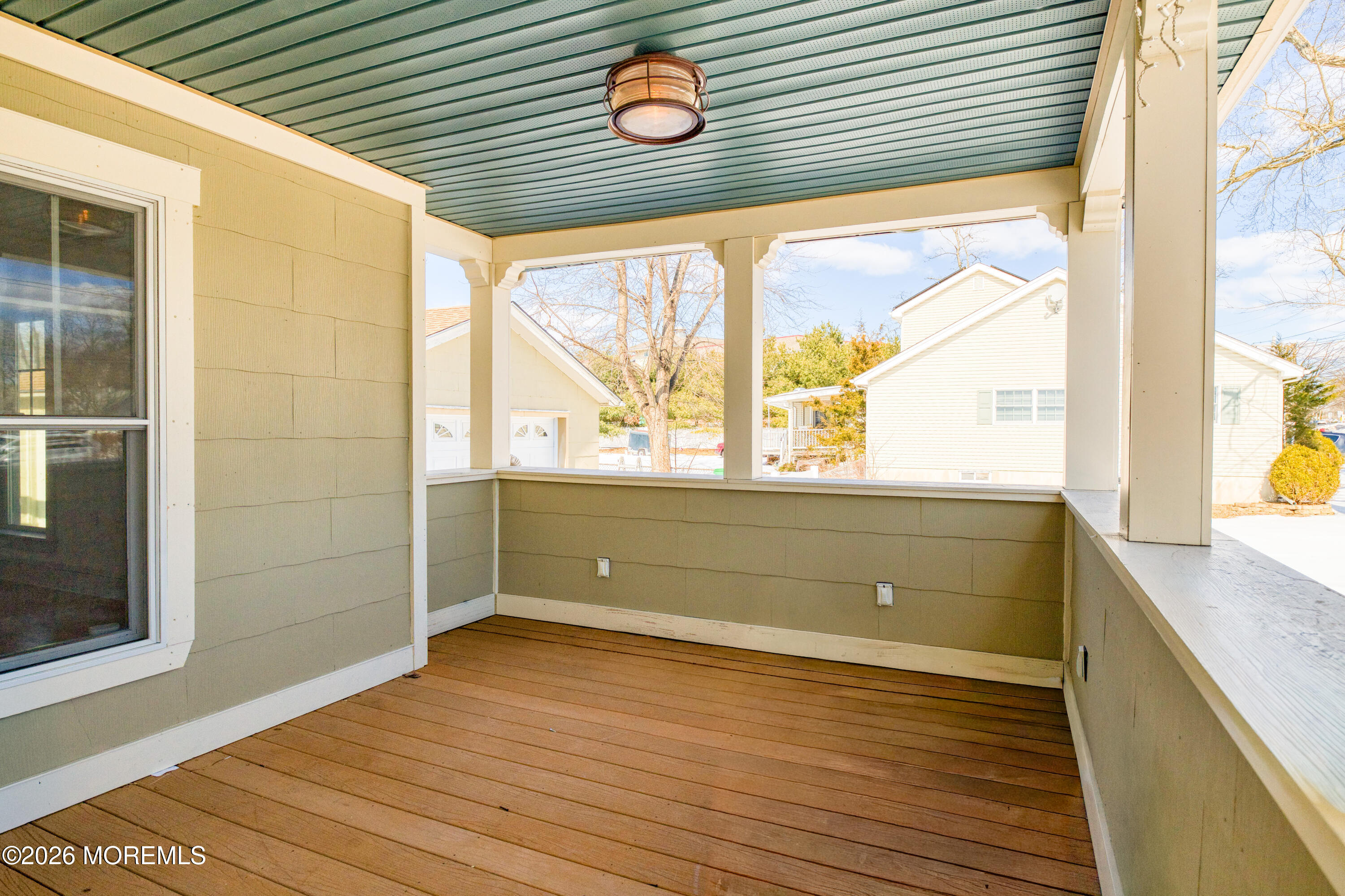 7 Schoolhouse Road Neptune Township, NJ 07753 - Photo 4 of 36 a view of a room with wooden floor and windows