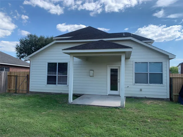 a view of backyard with green space