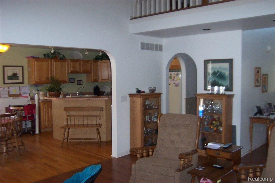 6199 Cowell Road Brighton, MI 48116 - Photo 14 of 23 great room towards kitchen