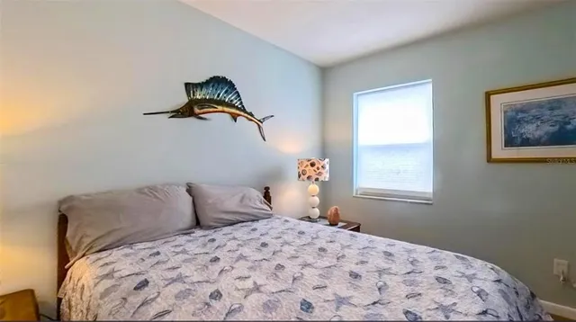 a bedroom with a bed and a closet