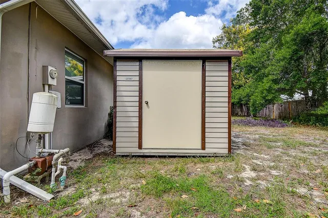a house view with a backyard space