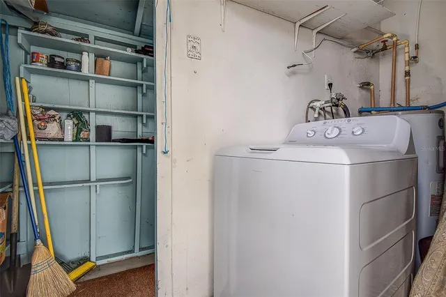 a storage room with washer and dryer