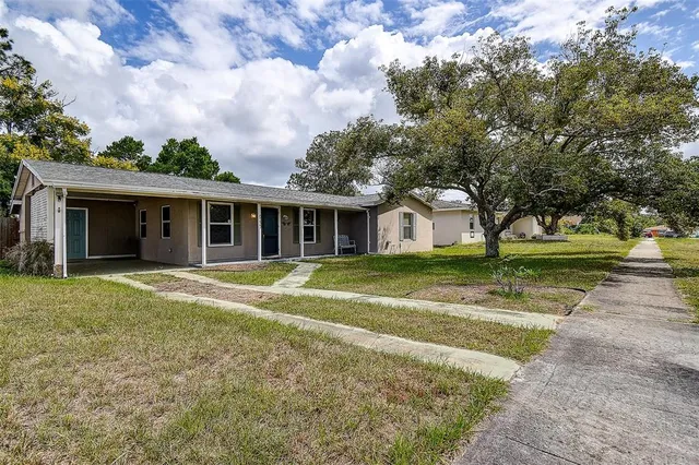 a view of a back yard of the house