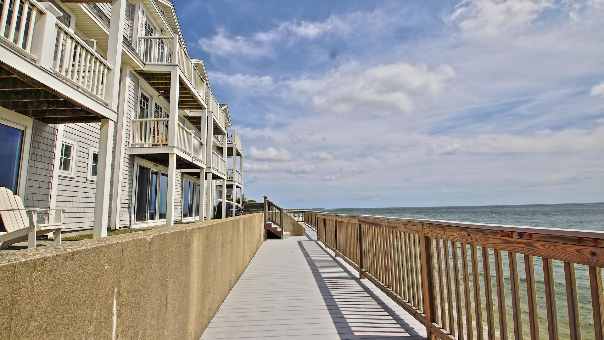 9 Chase Avenue, Unit U6 Dennis Port, MA 02639 - Photo 17 of 45 a view of a house with a large window
