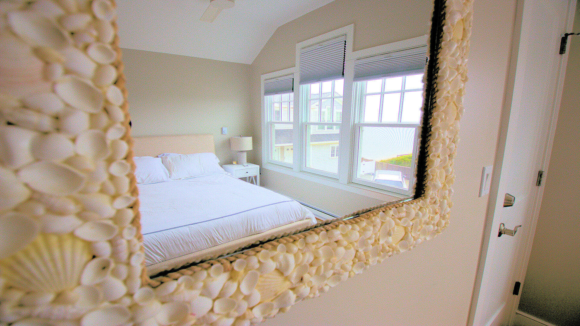 9 Chase Avenue, Unit U6 Dennis Port, MA 02639 - Photo 31 of 45 a bedroom with a bed and a window