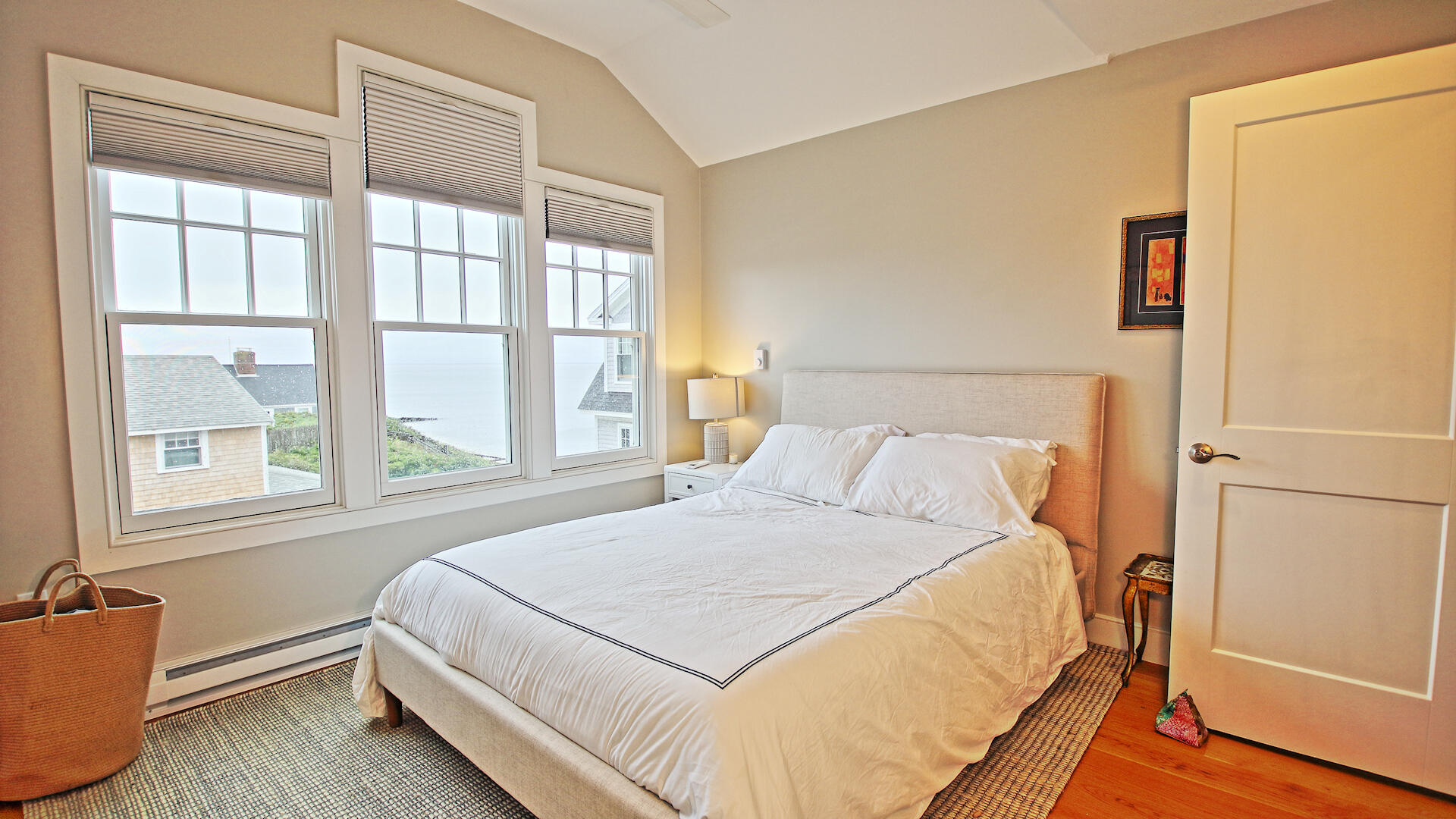 9 Chase Avenue, Unit U6 Dennis Port, MA 02639 - Photo 32 of 45 a large bed sitting in a bedroom next to a window