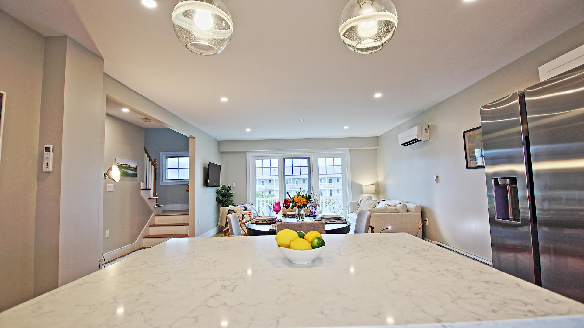 9 Chase Avenue, Unit U6 Dennis Port, MA 02639 - Photo 5 of 45 a very nice looking kitchen with furniture and a chandelier