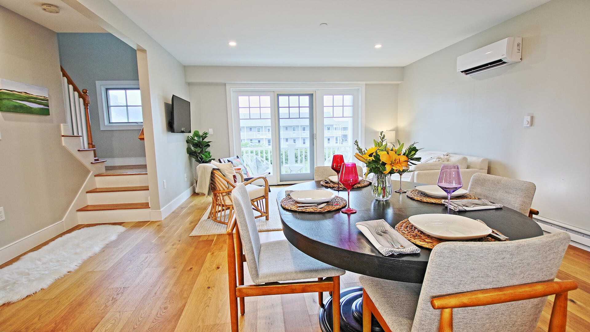 9 Chase Avenue, Unit U6 Dennis Port, MA 02639 - Photo 9 of 45 a view of a dining room with furniture a potted plant and wooden floor
