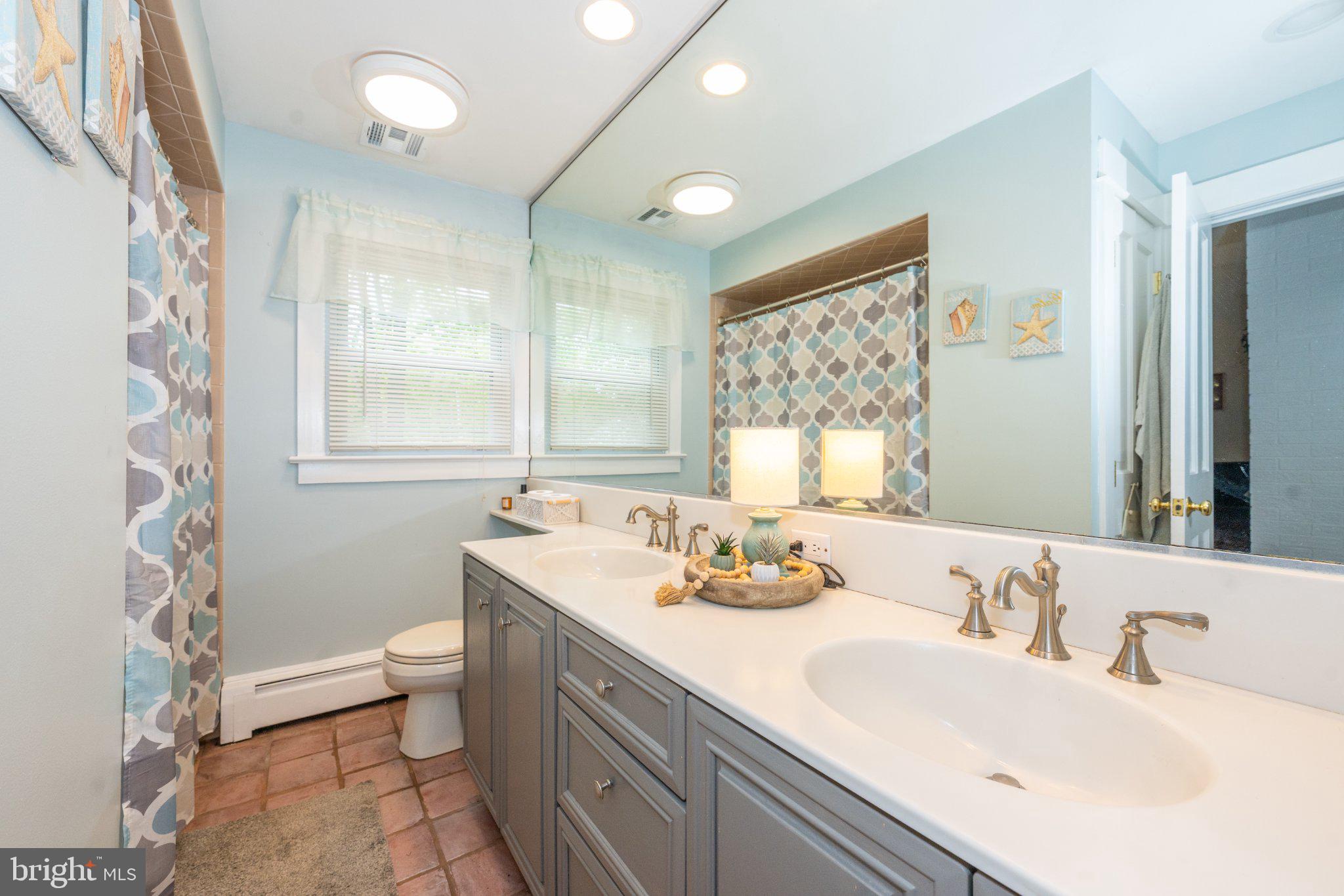 1 W Road Boonton, NJ 07005 - Photo 22 of 45 Serene coastal-inspired bathroom retreat.