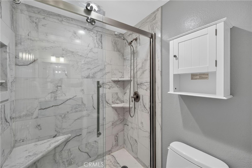 2935 Bluebell Avenue Brea, CA 92821 - Photo 27 of 38 Hallway bathroom with dual-sinks and beautiful walk-in shower!