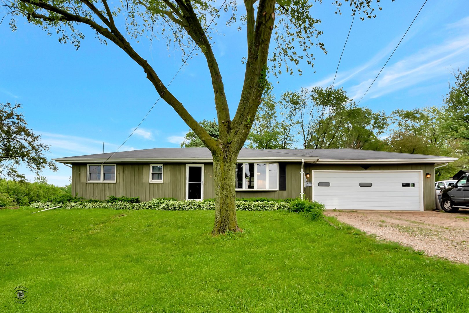 2780 North Cedar Road New Lenox, IL 60451 - Photo 1 of 25 a front view of a house with garden