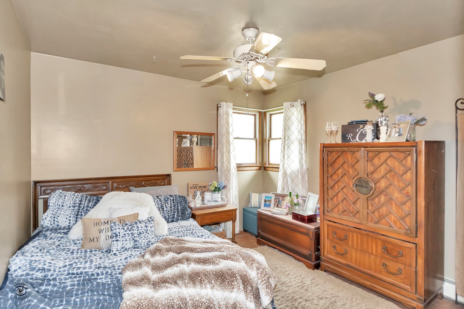 2780 North Cedar Road New Lenox, IL 60451 - Photo 13 of 25 a bedroom with a large bed and a chandelier