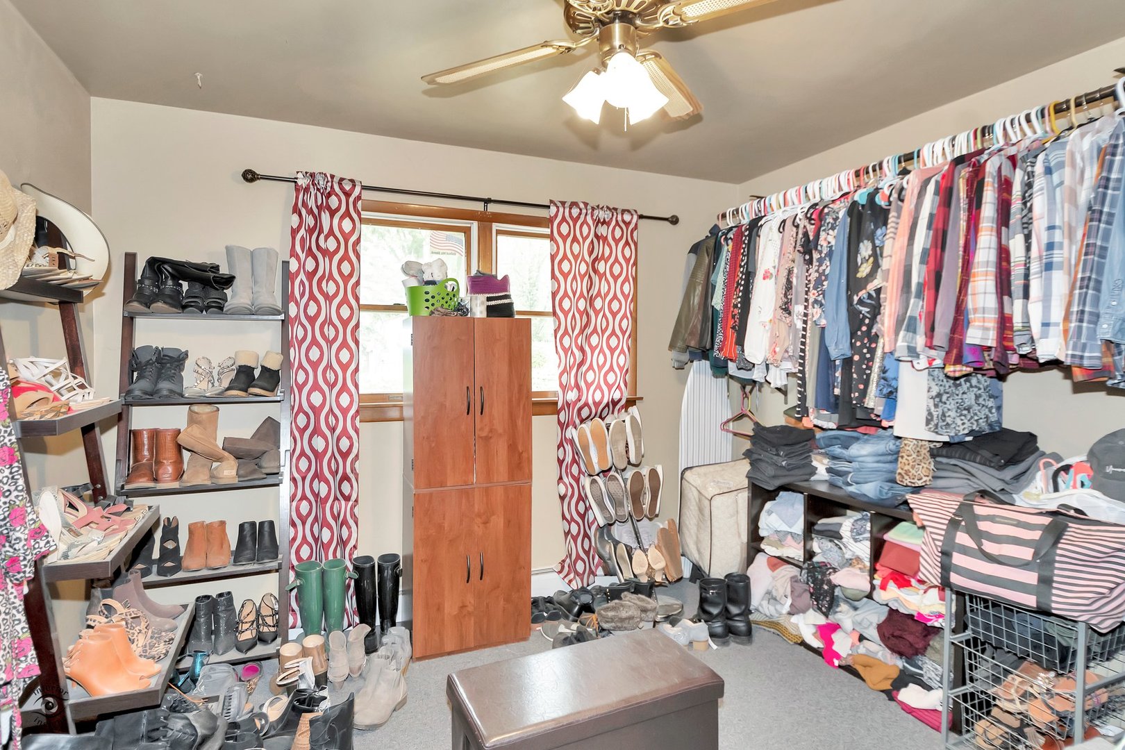 2780 North Cedar Road New Lenox, IL 60451 - Photo 14 of 25 a view of walk in closet with clothes and shoes