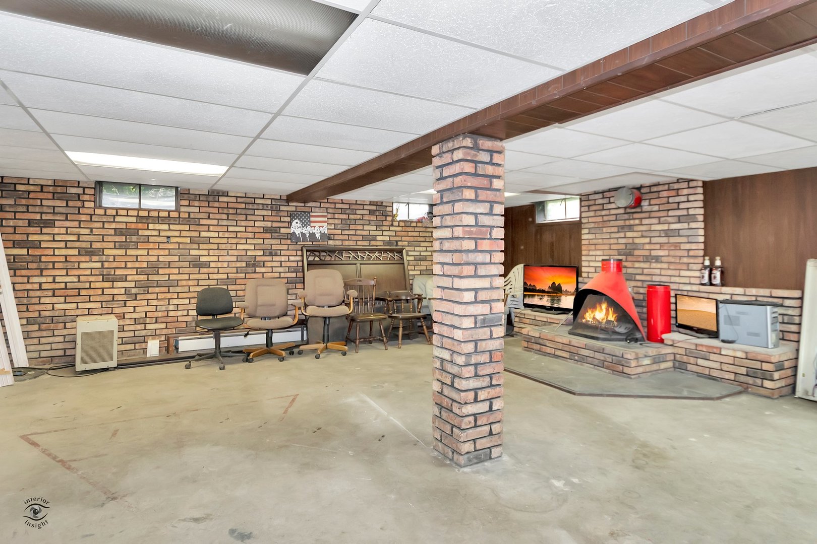 2780 North Cedar Road New Lenox, IL 60451 - Photo 18 of 25 a view of a garage with a table and chairs