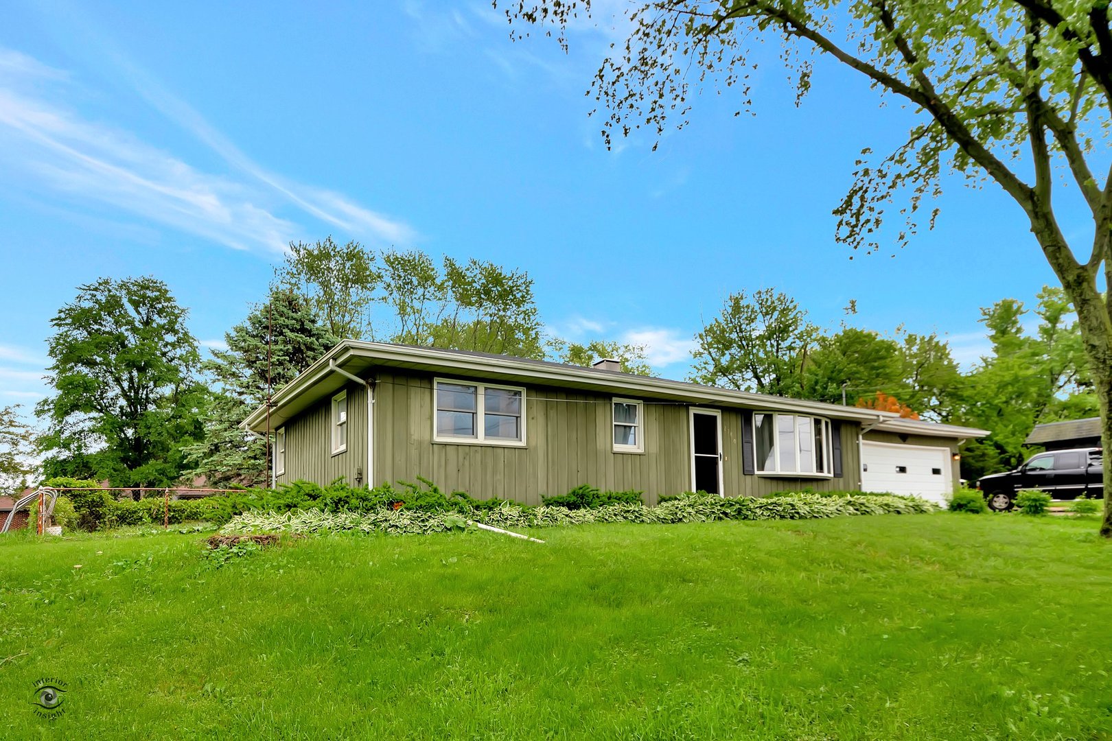 2780 North Cedar Road New Lenox, IL 60451 - Photo 2 of 25 a front view of a house with garden