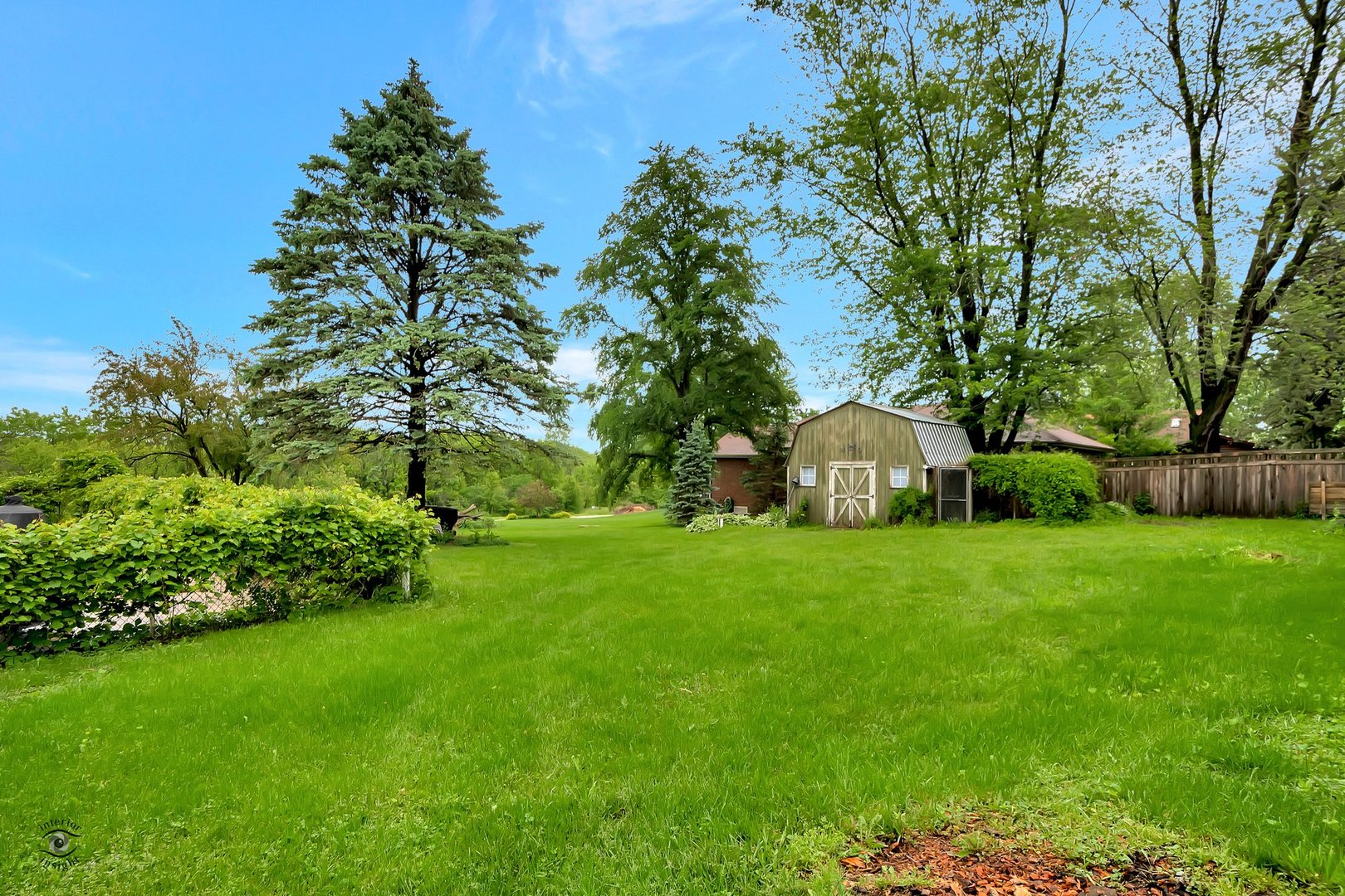 2780 North Cedar Road New Lenox, IL 60451 - Photo 22 of 25 a front view of a house with a yard and tree s
