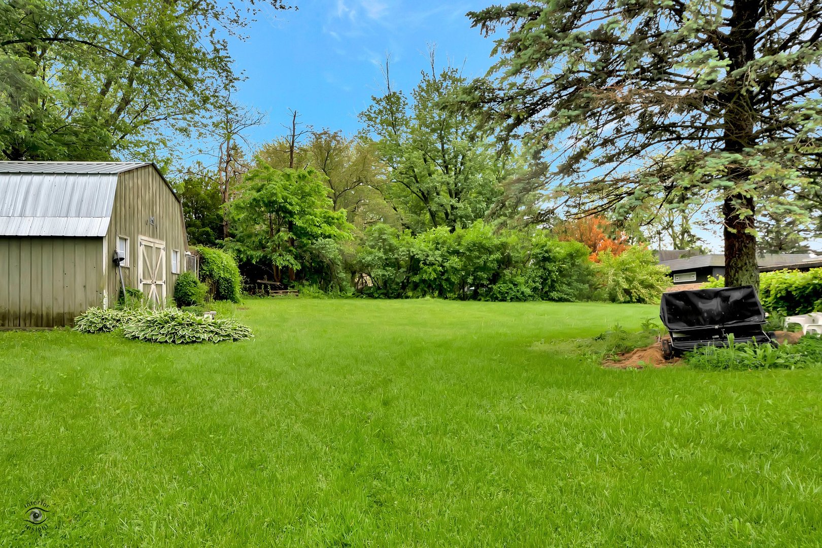 2780 North Cedar Road New Lenox, IL 60451 - Photo 23 of 25 a view of a garden with small plants and trees