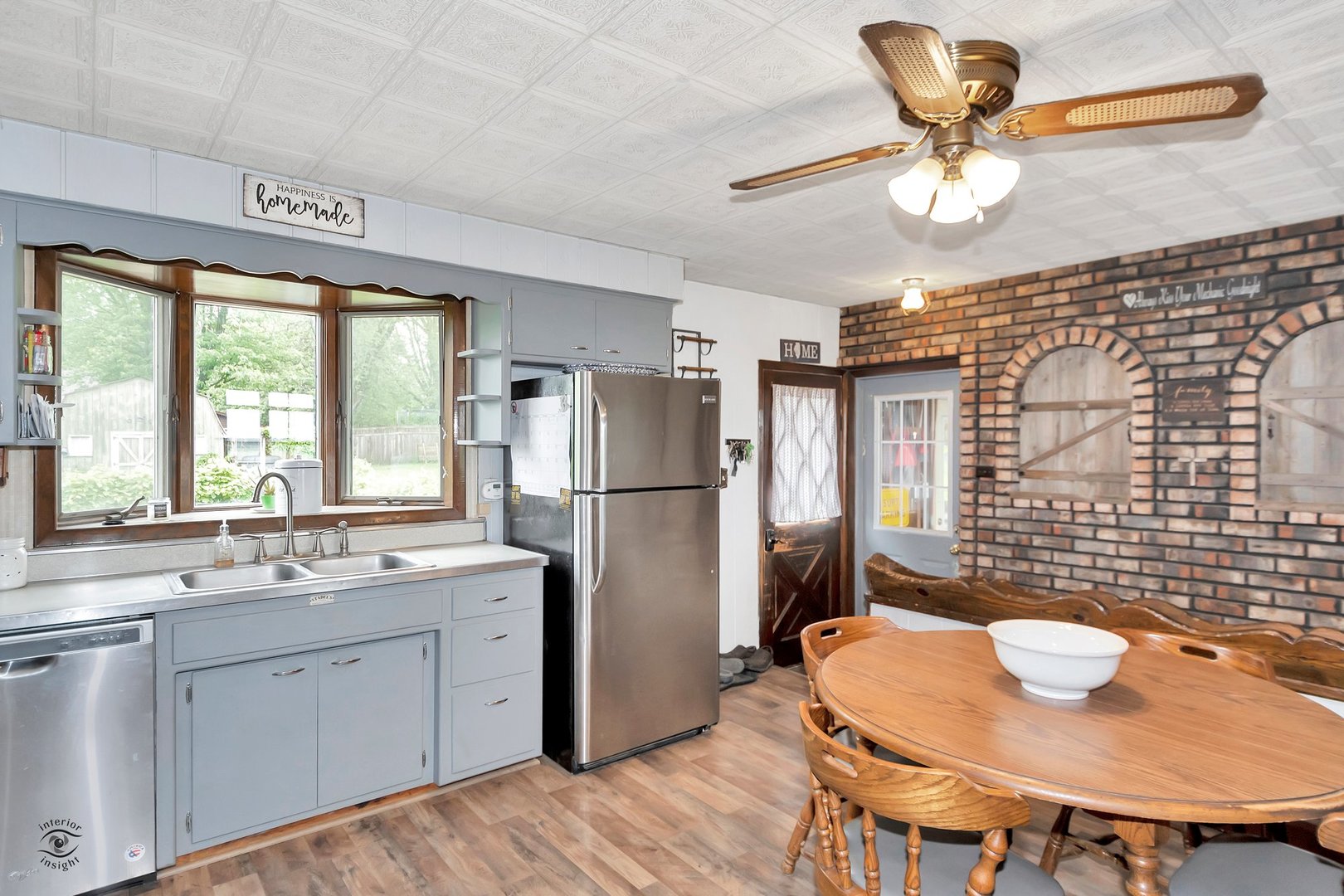 2780 North Cedar Road New Lenox, IL 60451 - Photo 6 of 25 a kitchen with a sink appliances and cabinets