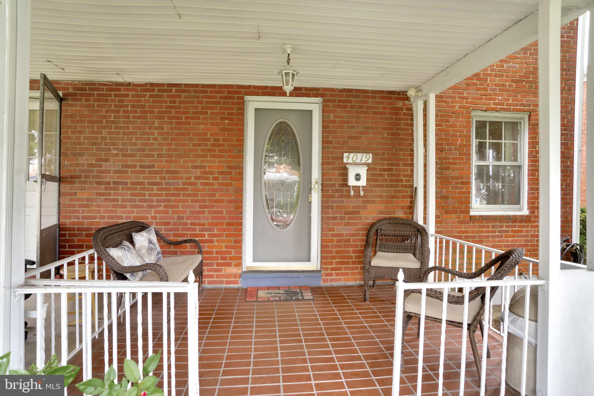 4019 Brookhill Road Baltimore, MD 21215 - Photo 2 of 15 Relax on the shady front porch