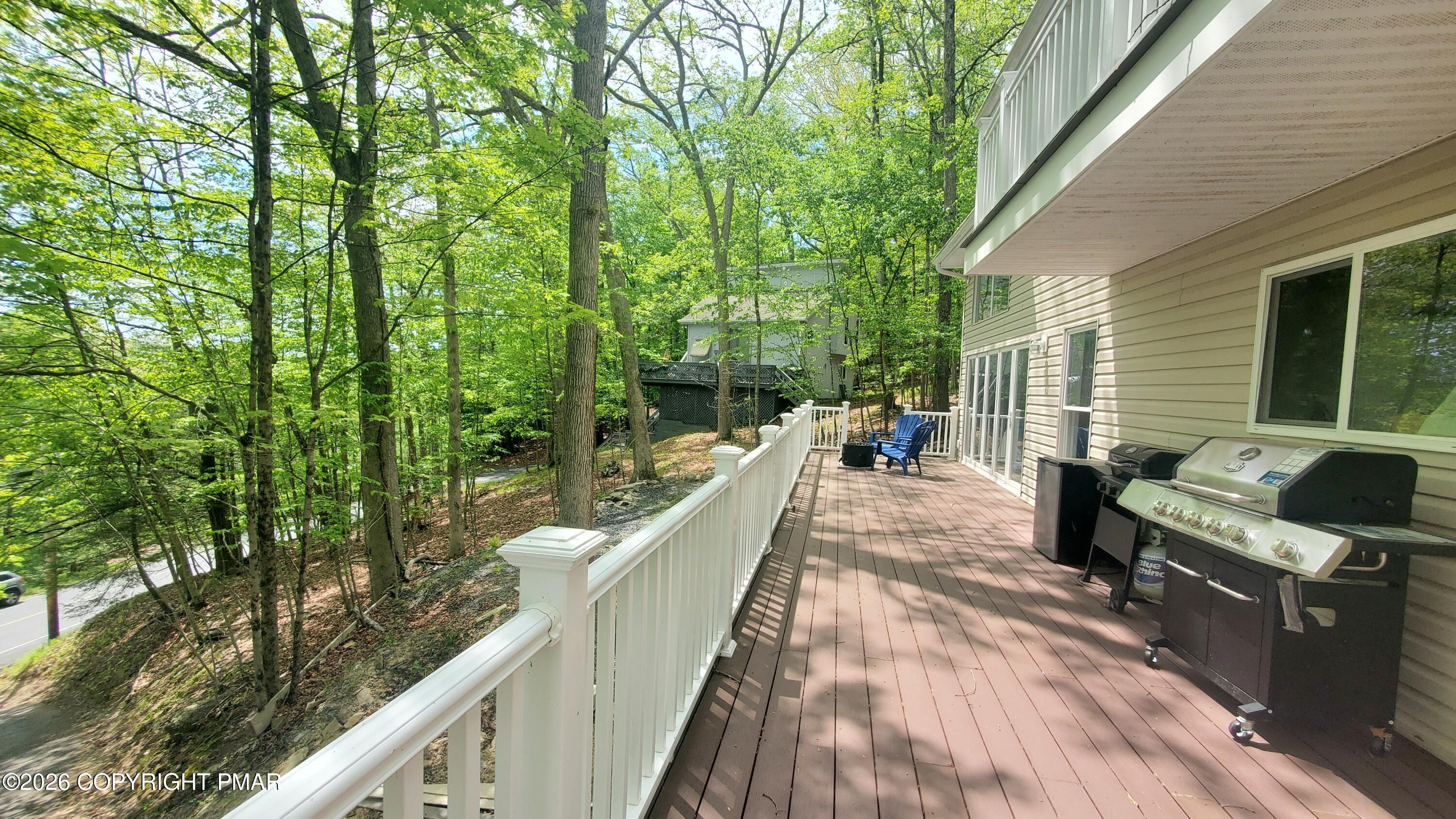 5873 Decker Road Bushkill, PA 18324 - Photo 25 of 57 a view of a balcony with chairs