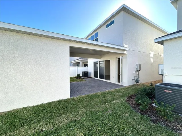 a front view of a house with yard