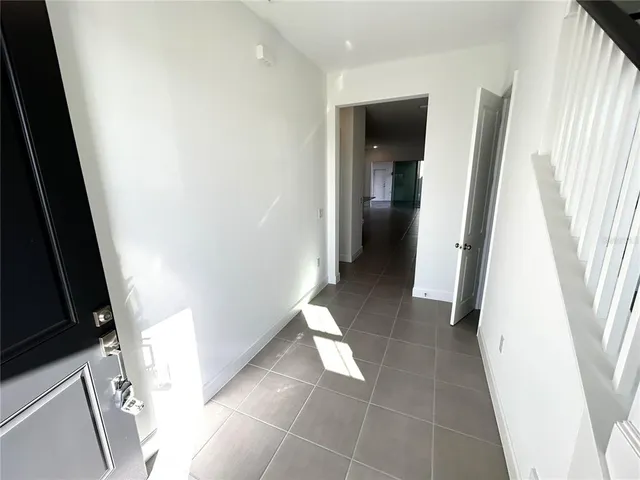 a view of entryway with furniture and a window