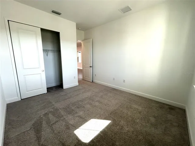 an empty room with closet