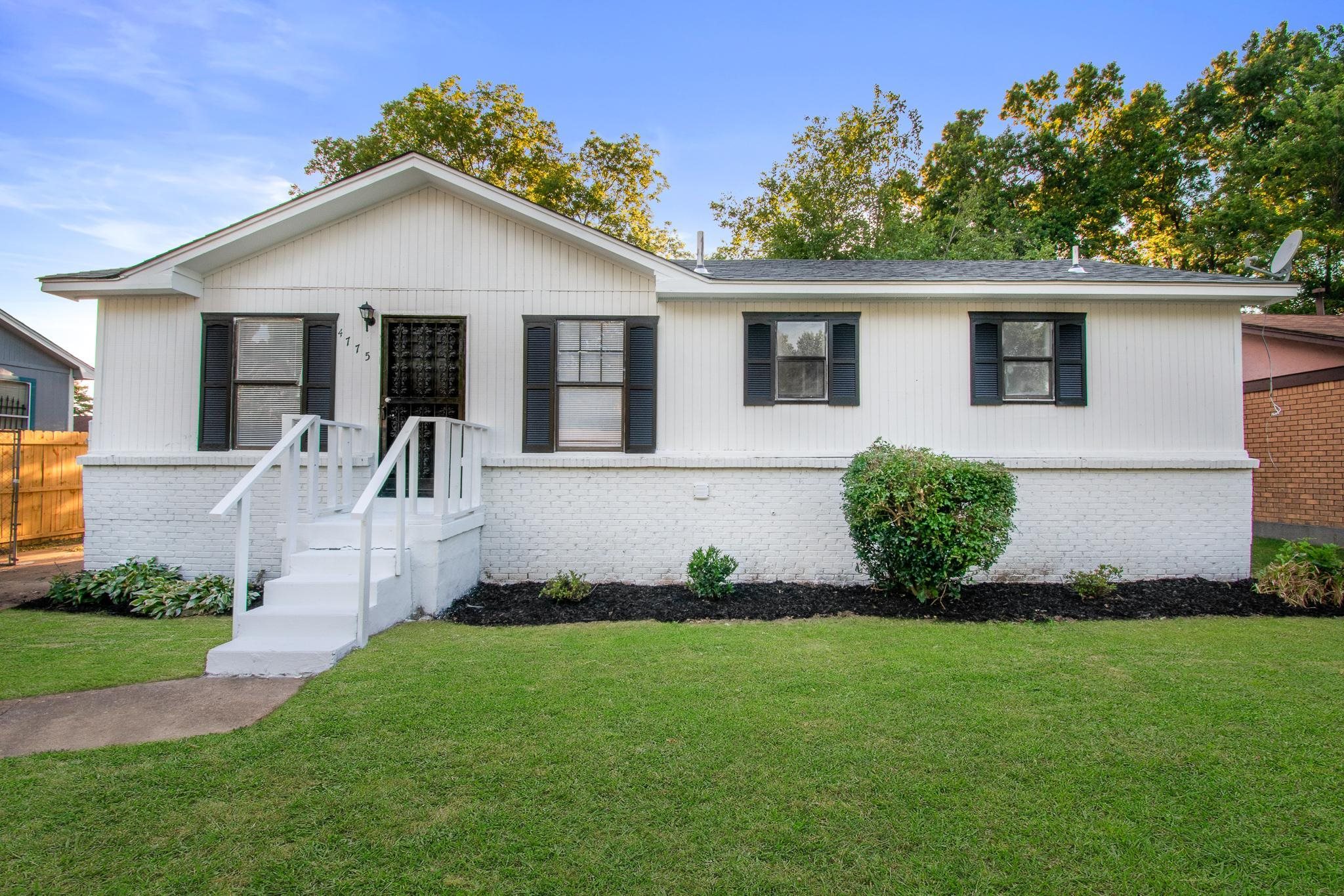 4775 Allrand Road Memphis, TN 38118 - Photo 1 of 21 a front view of a house with a garden