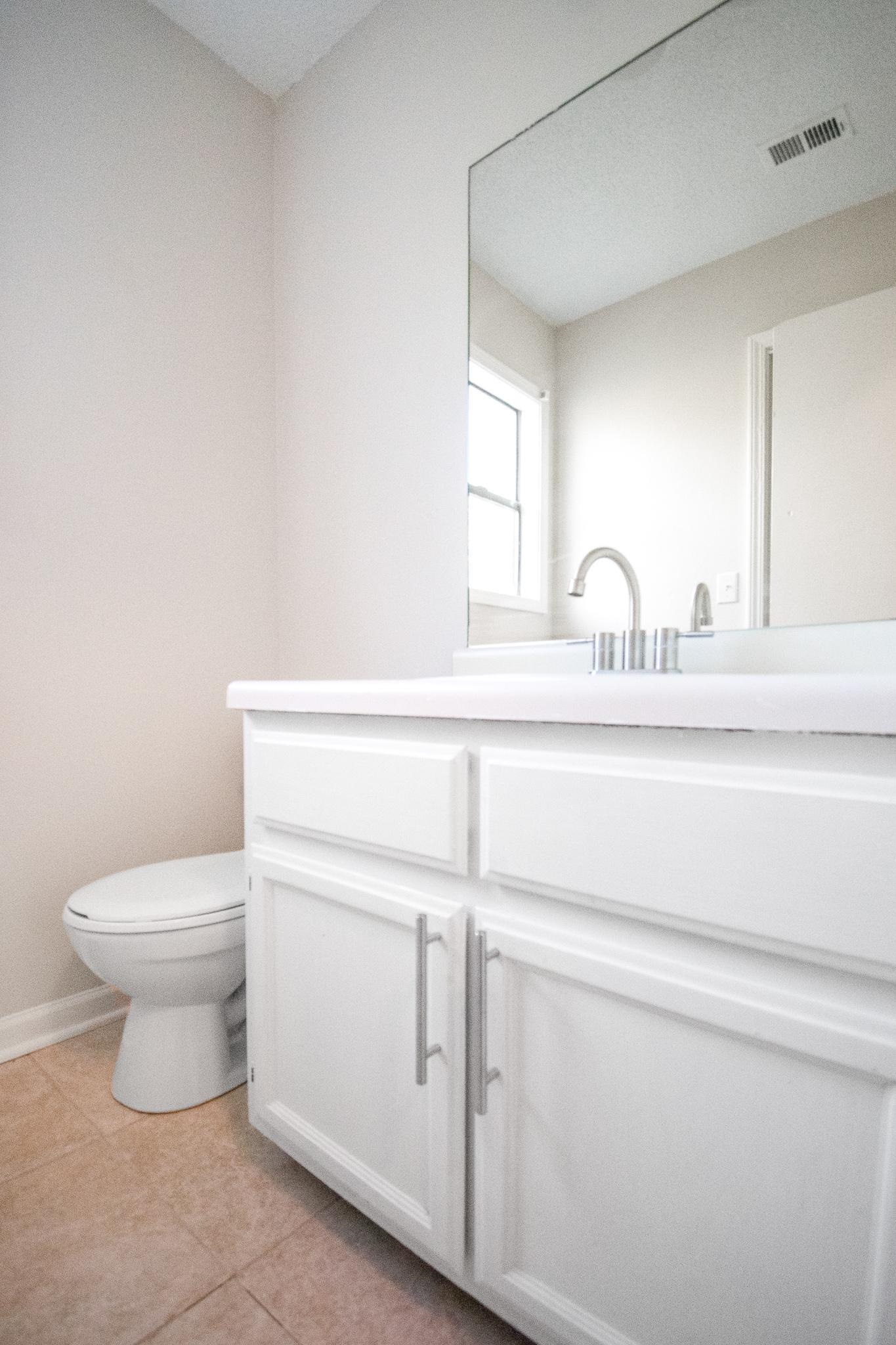 4775 Allrand Road Memphis, TN 38118 - Photo 12 of 21 a close view of toilet and a sink