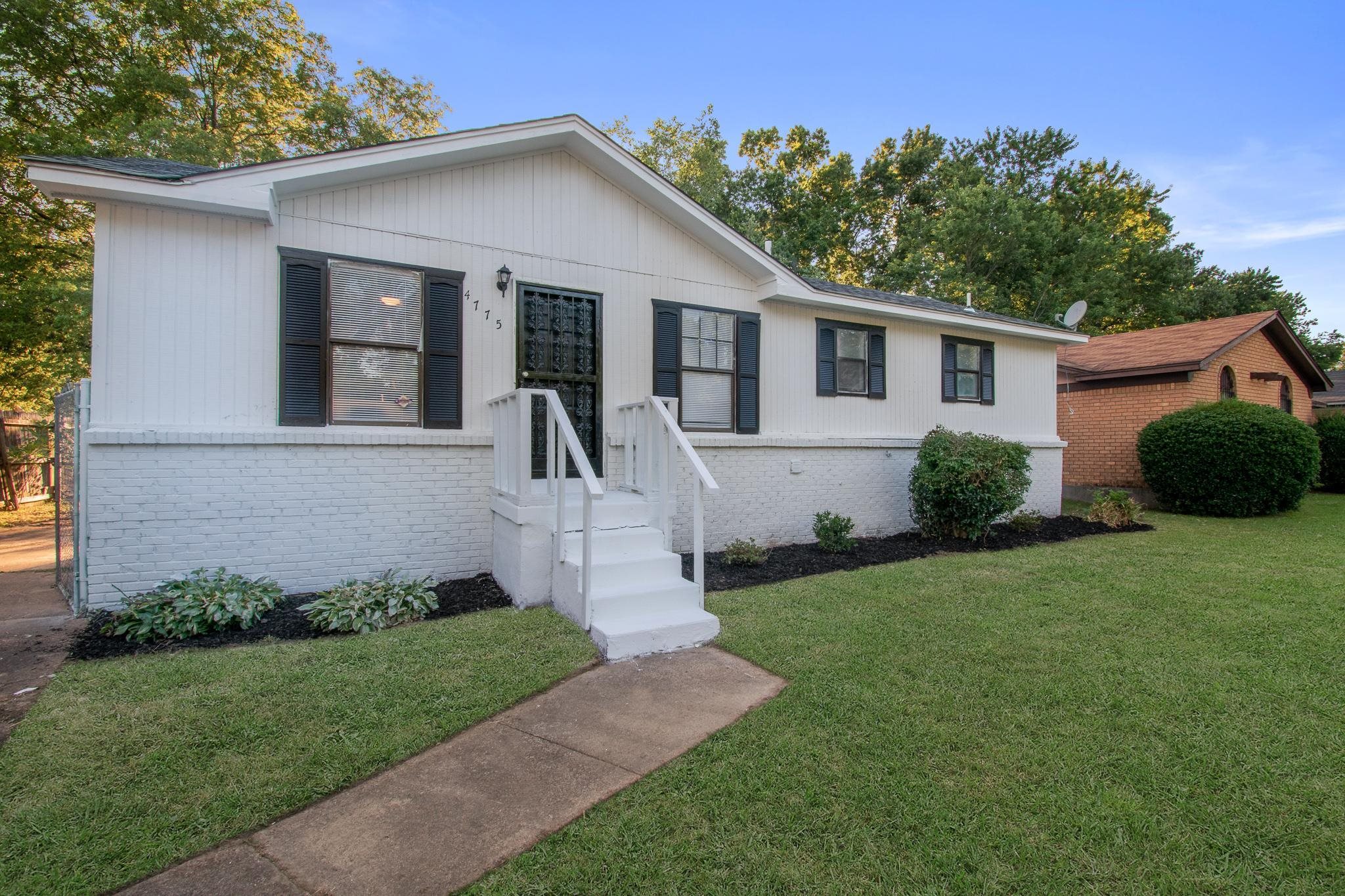 4775 Allrand Road Memphis, TN 38118 - Photo 3 of 21 a front view of a house with garden