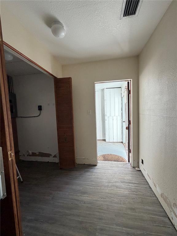 6131 Lafayette Street New Port Richey, FL 34652 - Photo 17 of 34 an empty room with wooden floor and windows