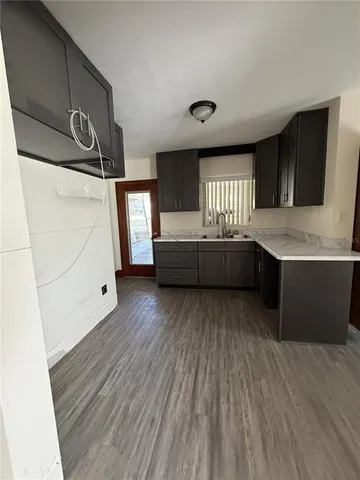 a living room with a hard wood floor