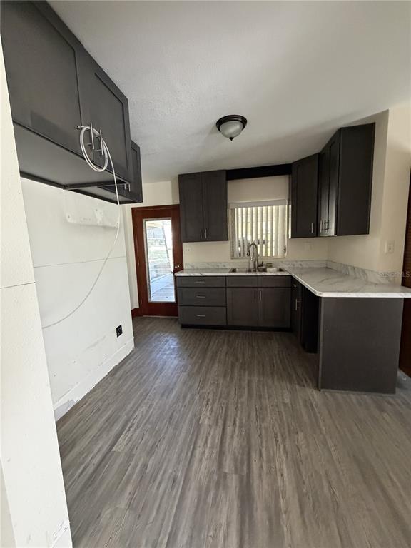 6131 Lafayette Street New Port Richey, FL 34652 - Photo 27 of 34 a living room with a hard wood floor