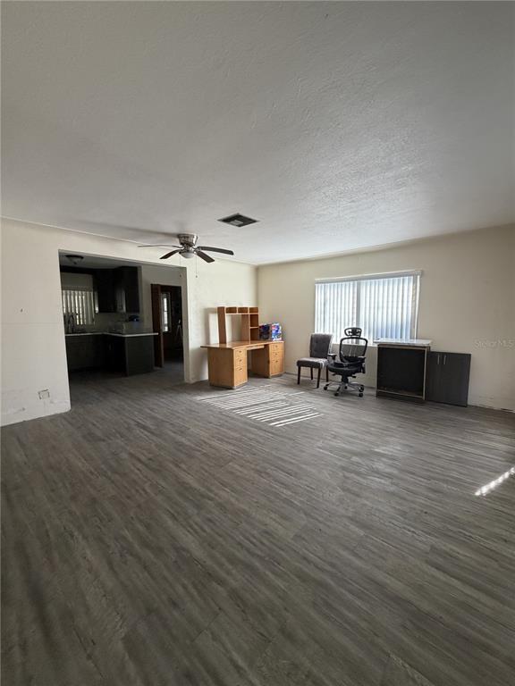 6131 Lafayette Street New Port Richey, FL 34652 - Photo 32 of 34 a living room with furniture and a flat screen tv