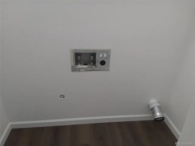 a view of small space with racks on the wall