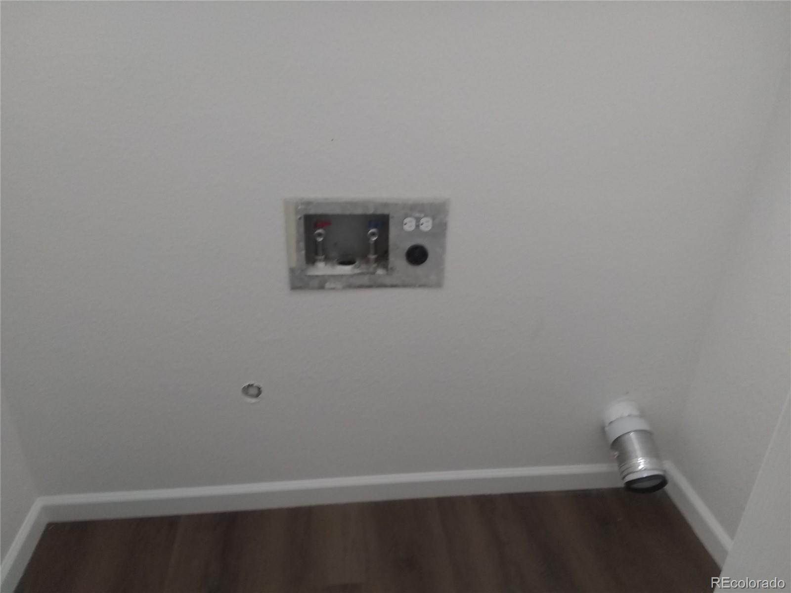 Undisclosed Address Aurora, CO 80011 - Photo 7 of 14 a view of small space with racks on the wall