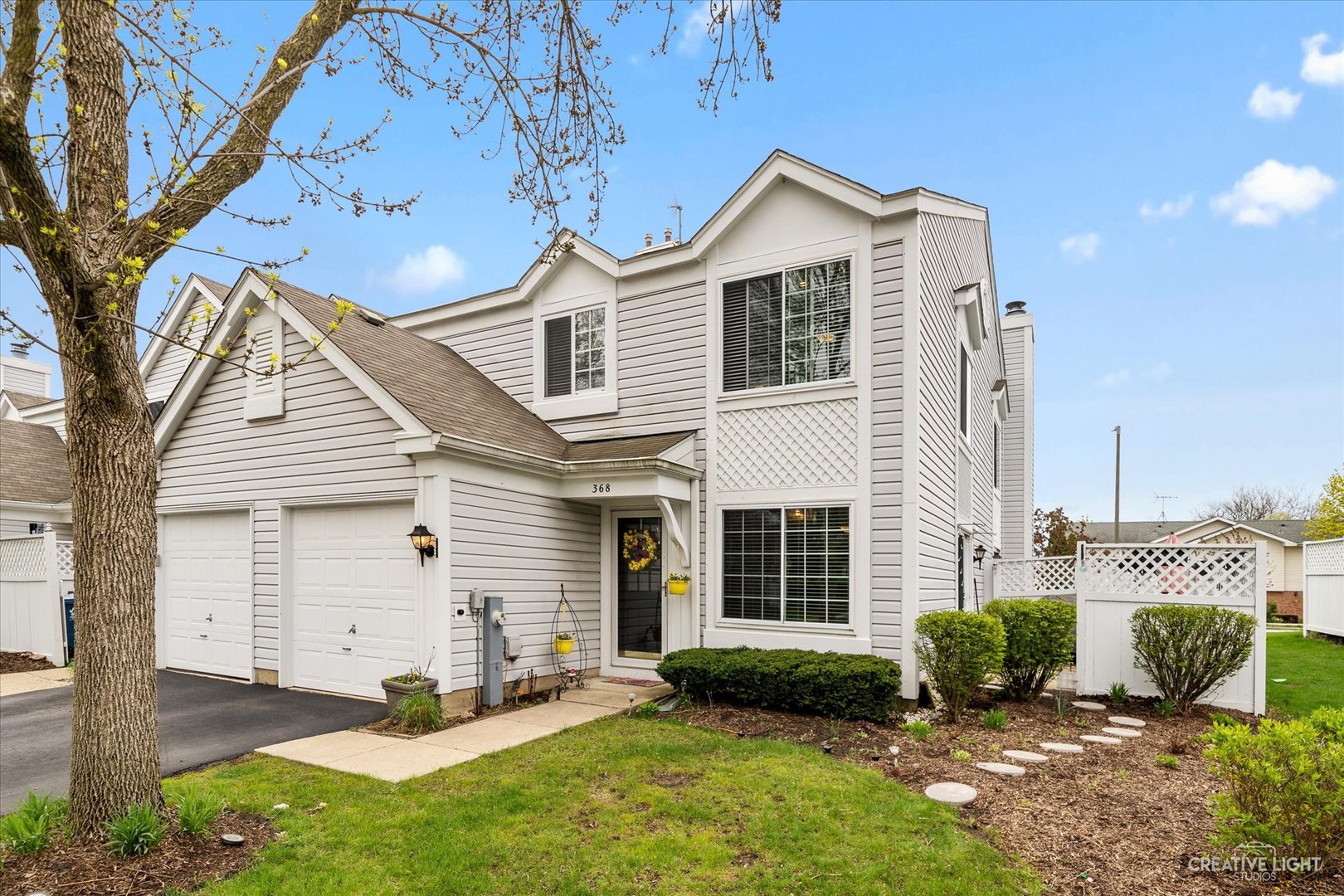 368 Bunker Hill Circle Aurora, IL 60504 - Photo 15 of 15 a view of a house with a yard