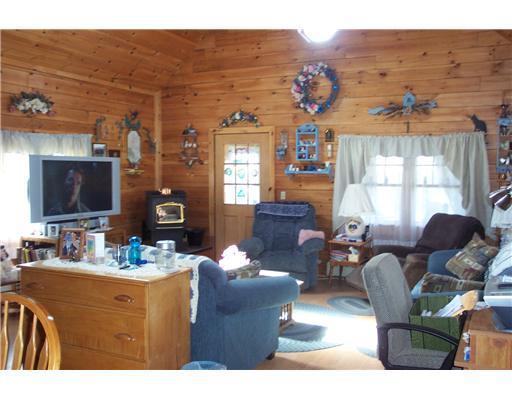 755 Pulcifur Road Mapleton, ME 04757 - Photo 3 of 9 Living Room.