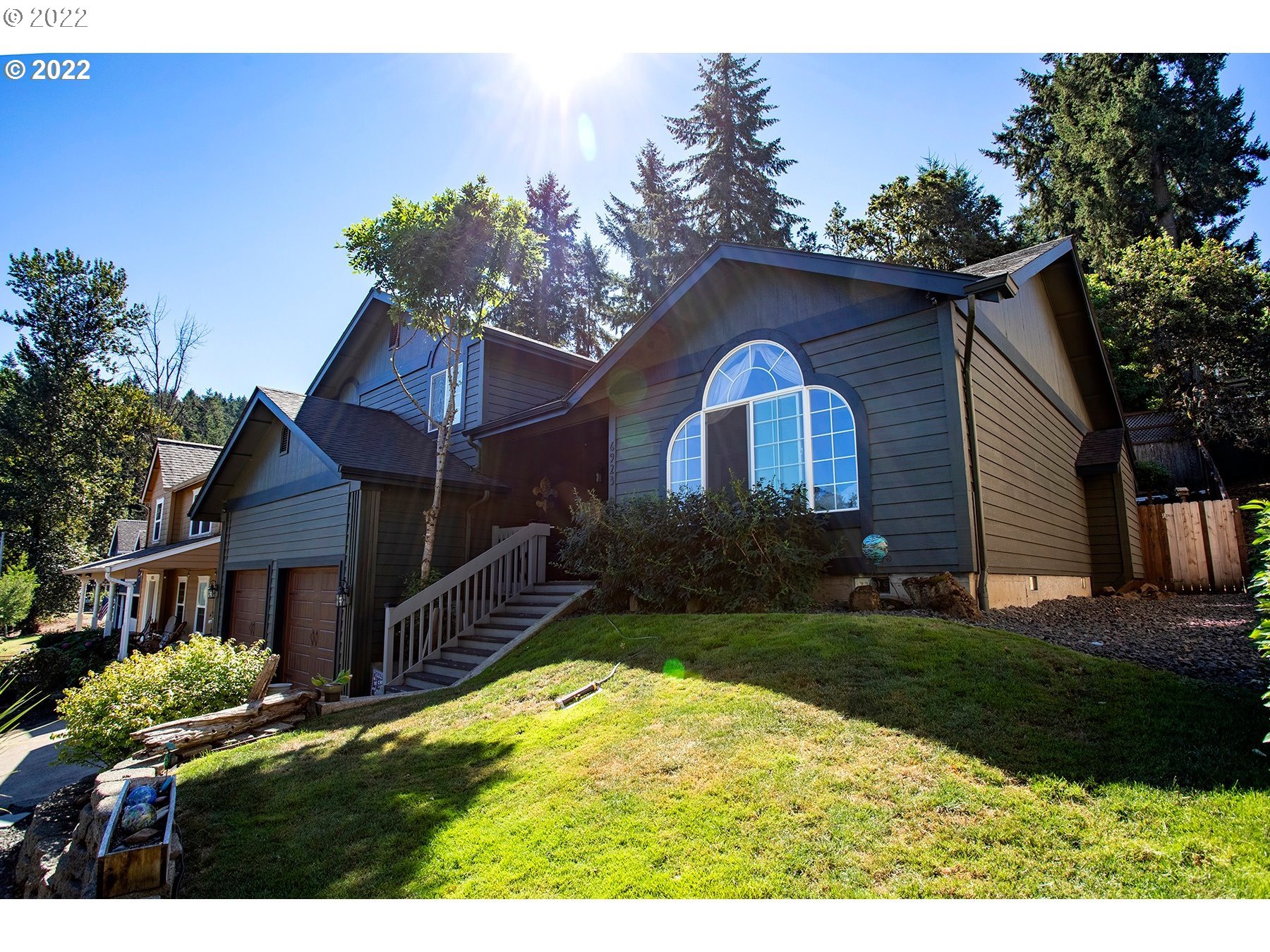 6923 Ivy Street Springfield, OR 97478 - Photo 3 of 32 a front view of a house with a yard