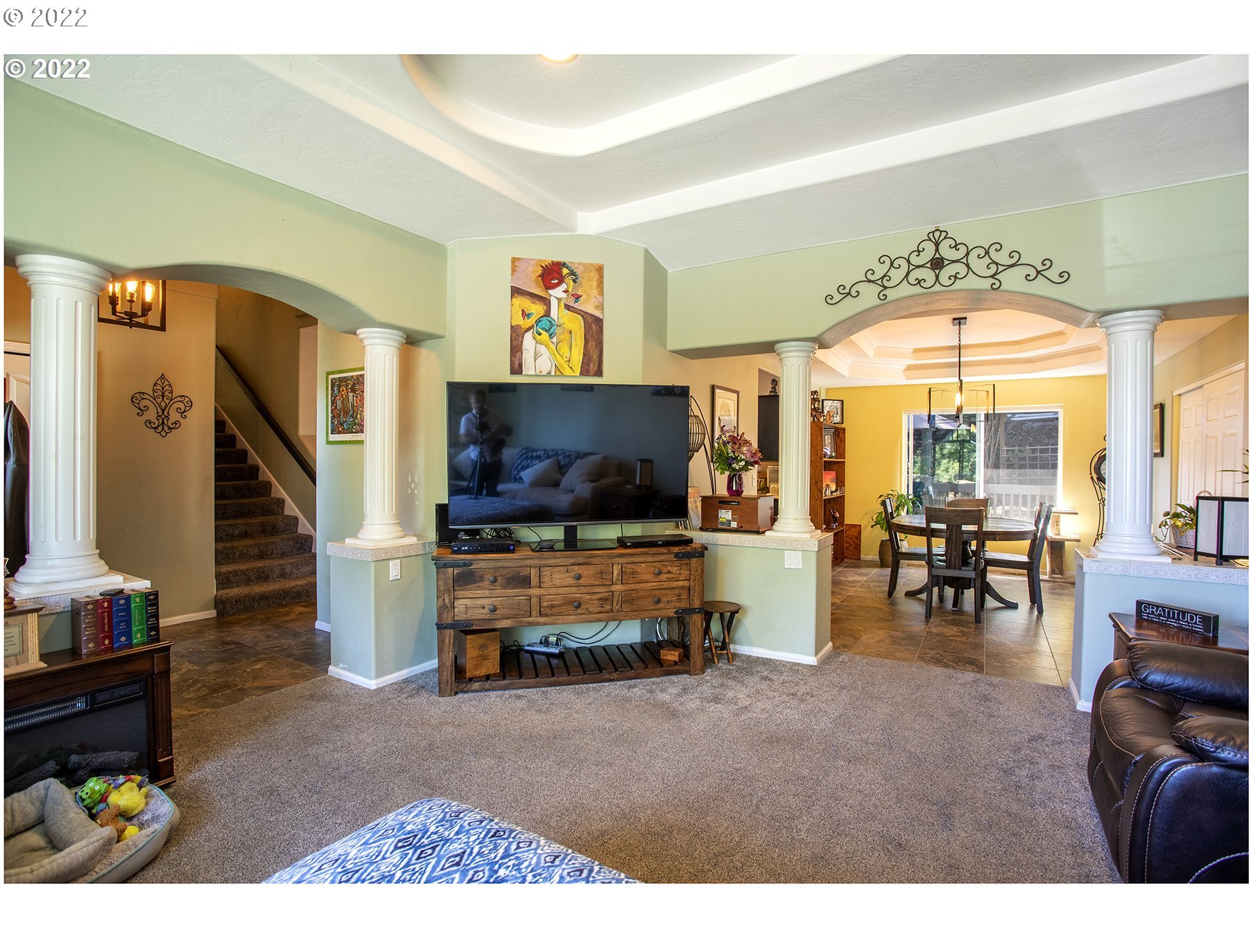 6923 Ivy Street Springfield, OR 97478 - Photo 7 of 32 a living room with furniture and a flat screen tv